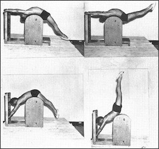 A black and white photo of a man doing exercises on a pilates machine