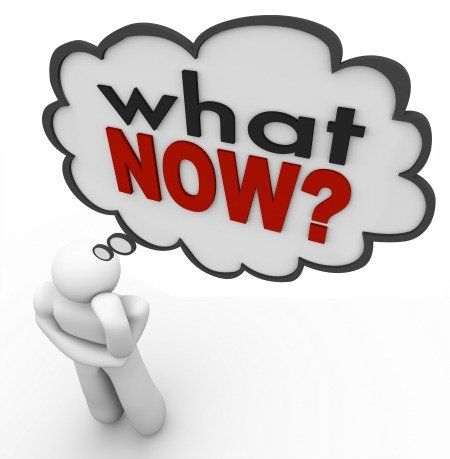 A person is looking at a thought bubble that says what now