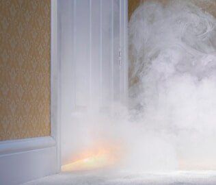 Smoke coming in from under door — Fire Damage Restoration in Neptune, NJ
