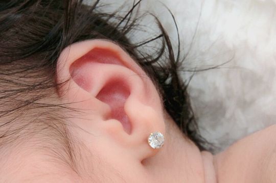 Baby with earrings - Custom Jewelry, Engraving and Jewelry Repairs in Cambridge, Massachusetts Baby with earrings - Custom Jewelry, Engraving and Jewelry Repairs in Cambridge, Massachusetts