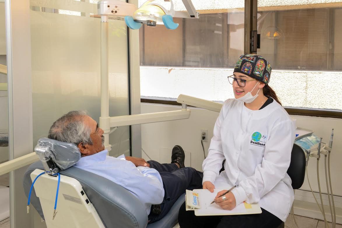 dentist with patient at dentiland