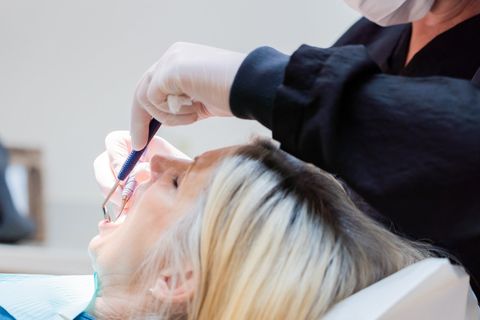 Patient having dental exam at Tecumseh Family Dental Care