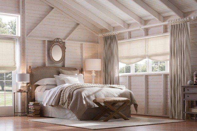 Relaxed Soft white Roman Shades in bedroom
