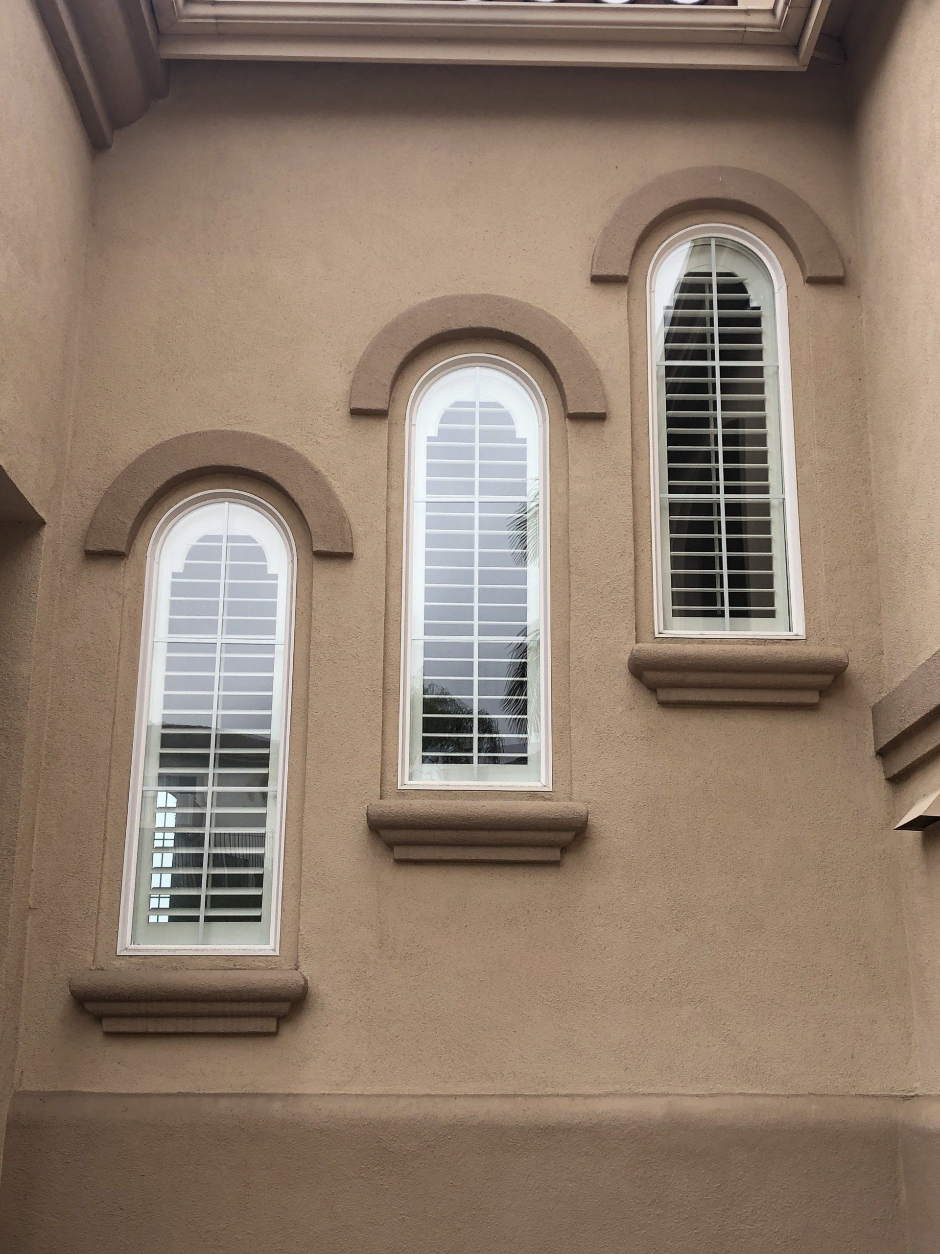 Arched Plantation Shutters in Carlsbad, CA home.