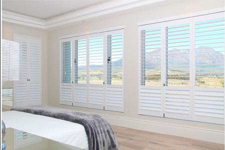 Plantation Shutters with split tilt in bedroom