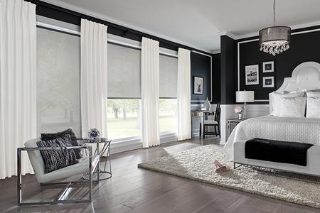 Roller Shades & Draperies in master bedroom