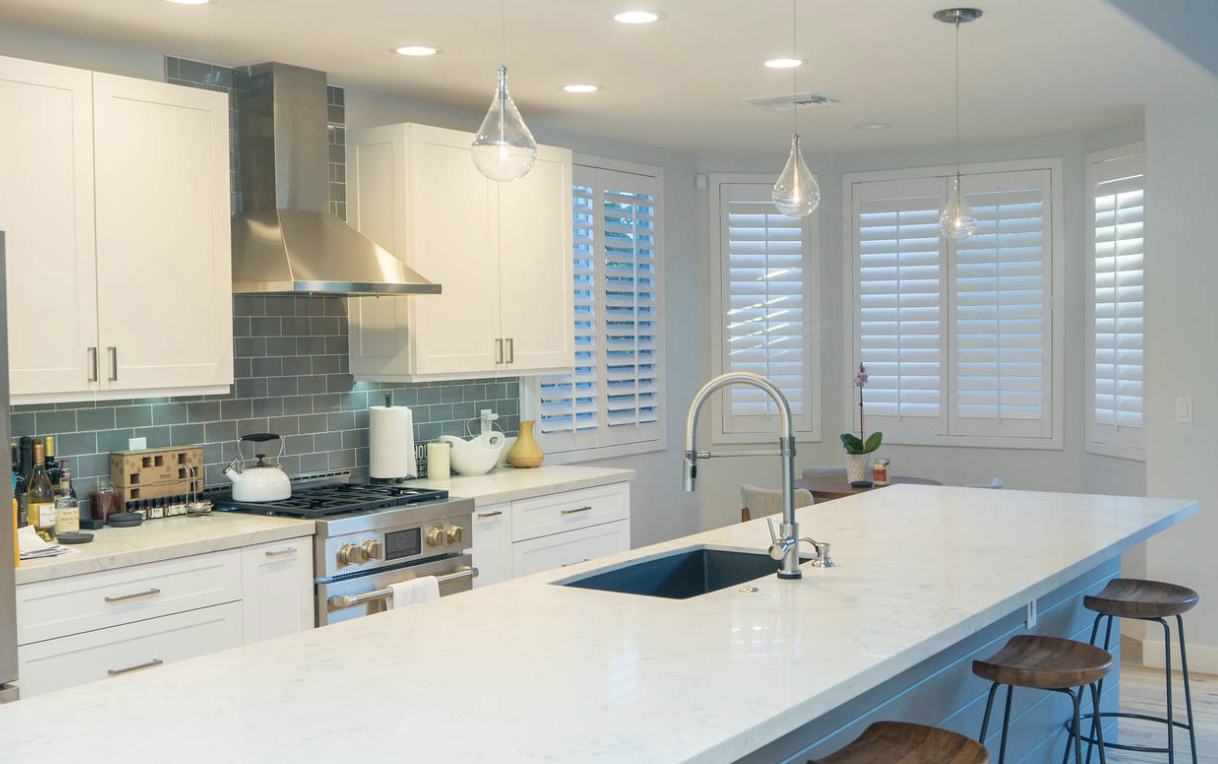 White Plantation Shutter by Window Spaces in Carlsbad, CA kitchen.