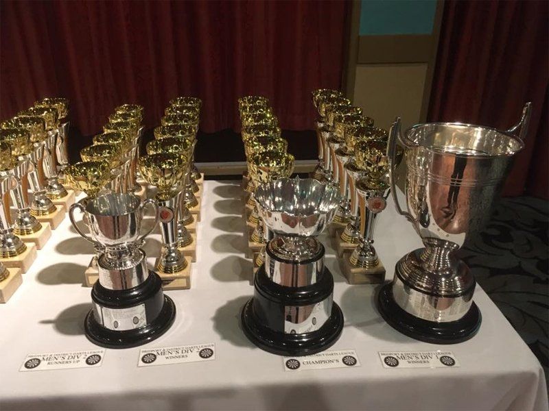 Silver trophies on a table