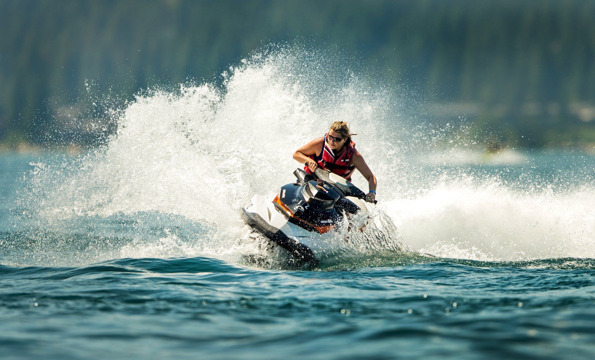 Fun on a wave runner during a company's exclusive reward trip for employees