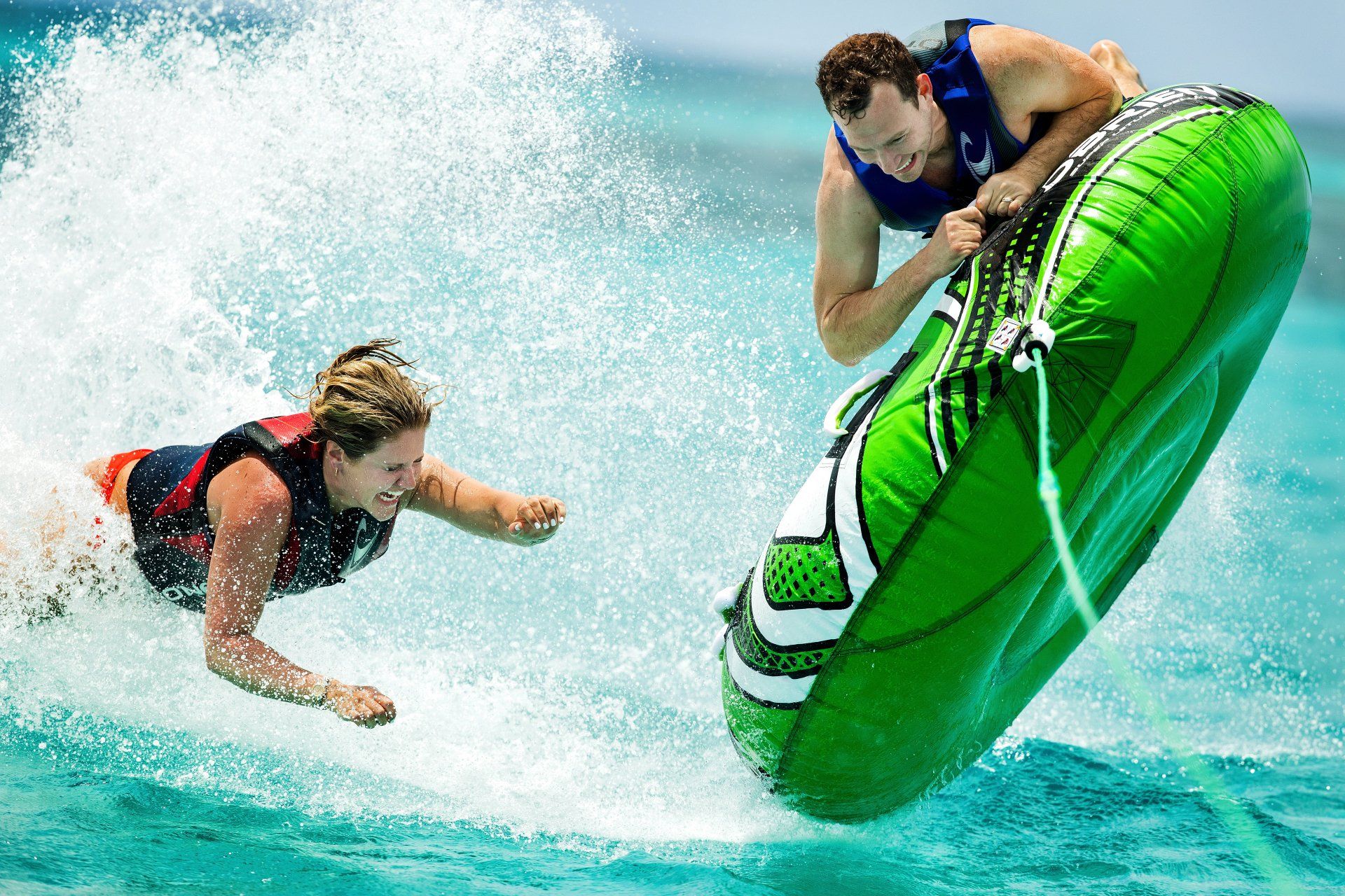 Action shot of employee incentive winners enjoying water  sports on business trip