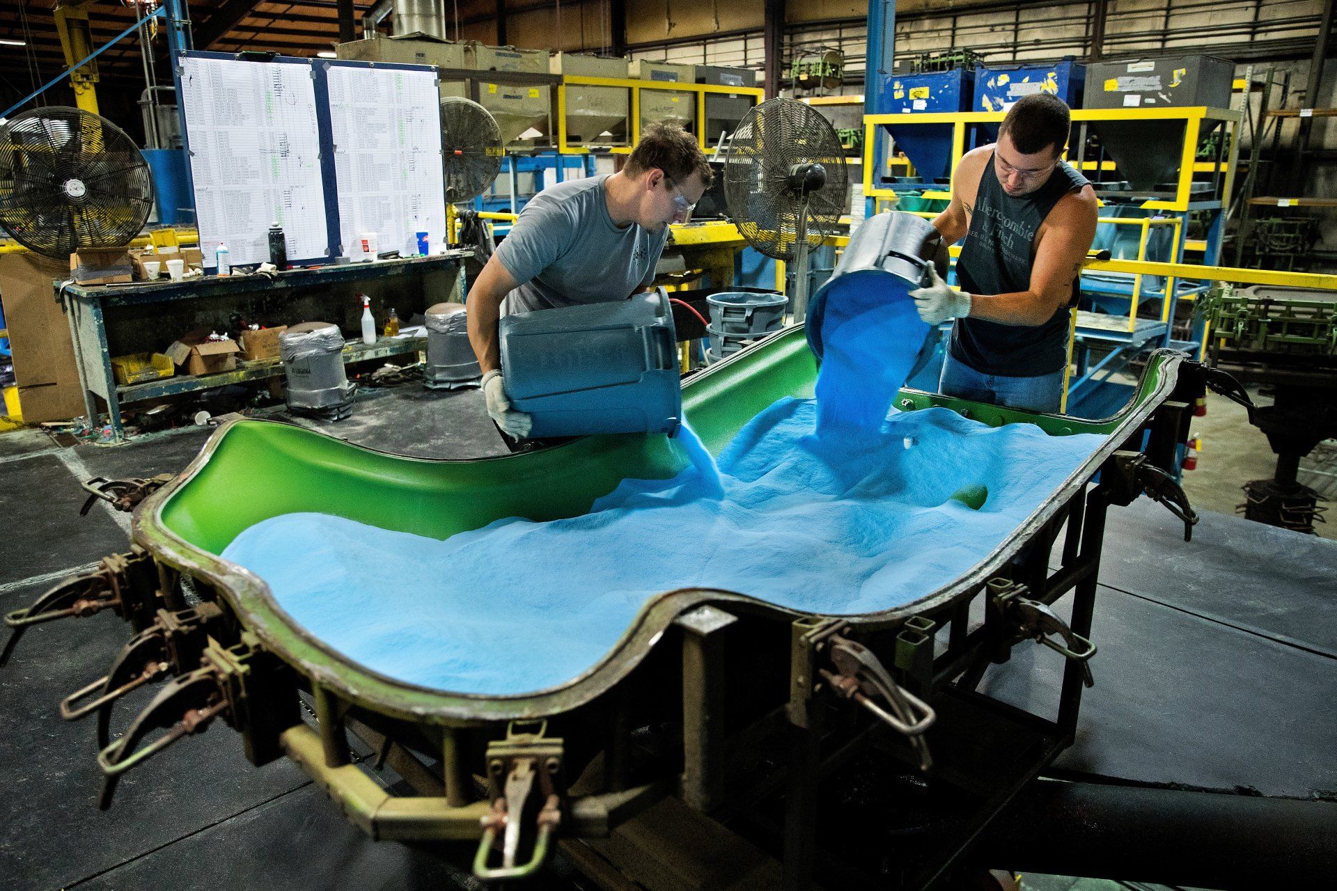 Younger manufacturing employees shown at work help reverse industry stigma.