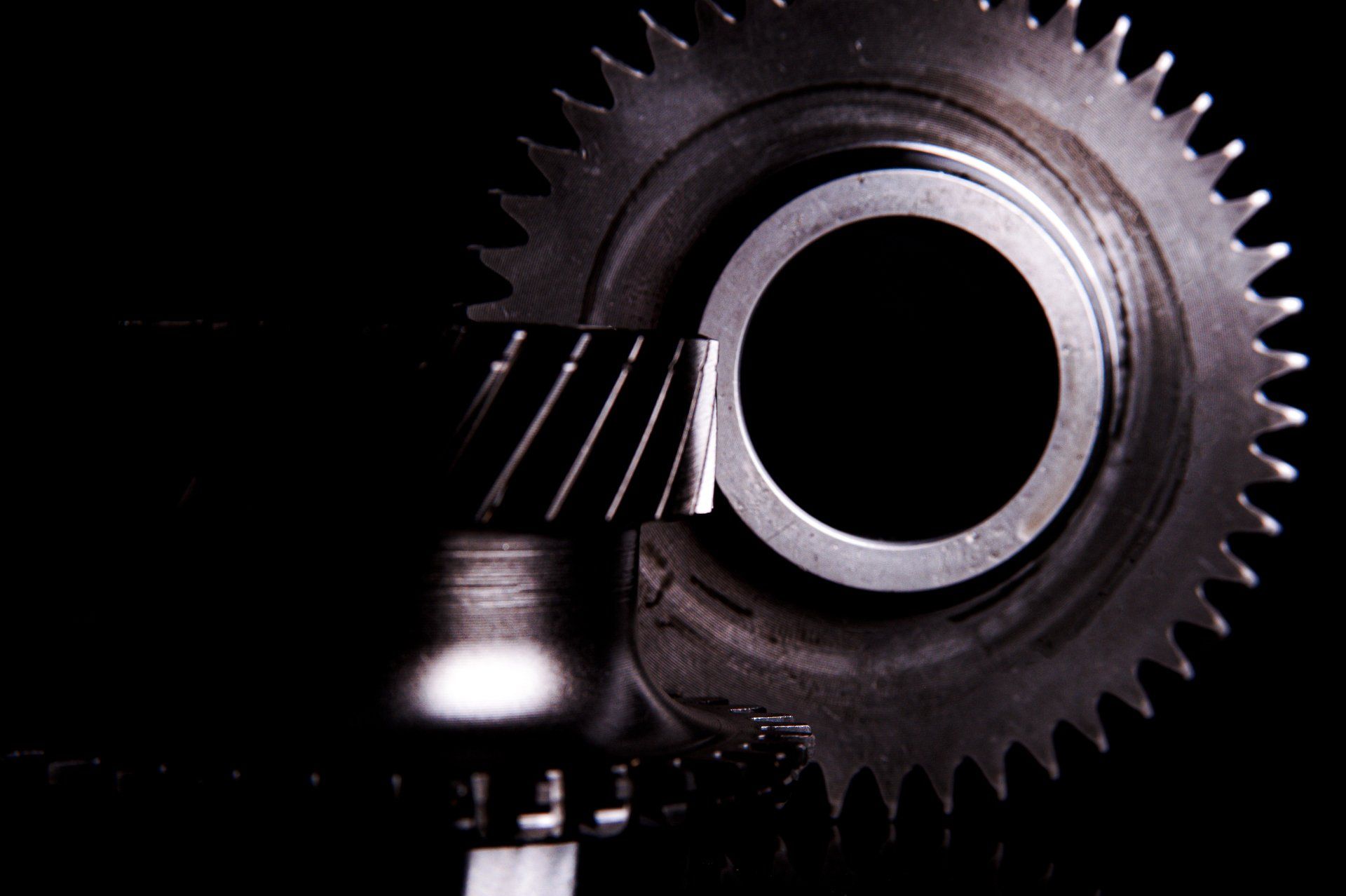 Vapour blasting gearbox on black blackground