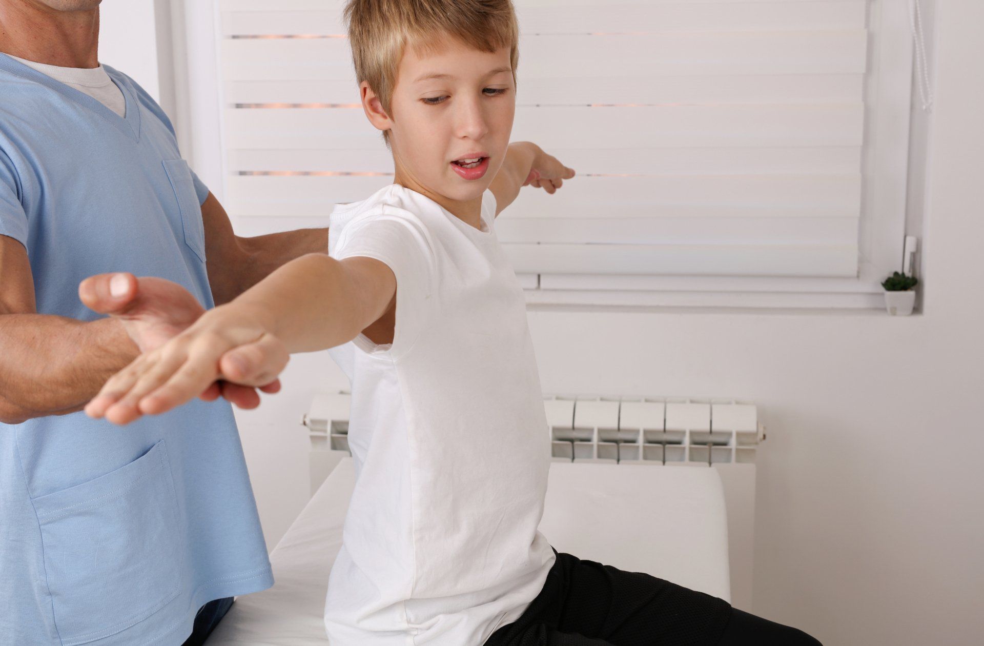 kid at chiropractor