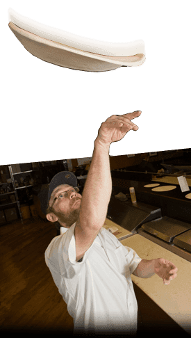 pizza chef tossing up dough