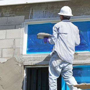 plaster being applied externally