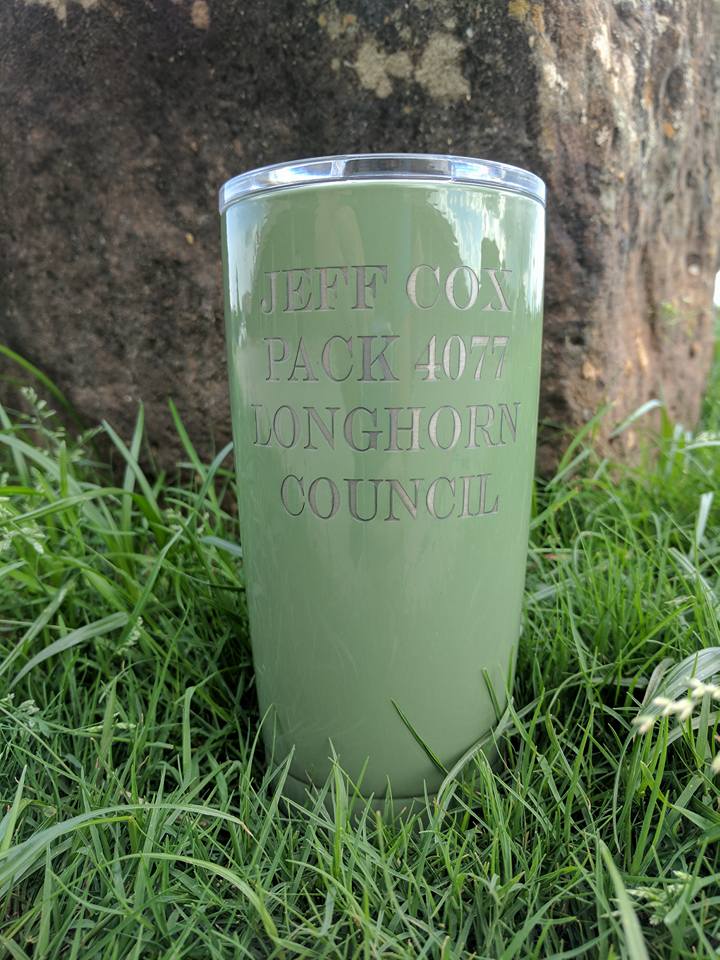 Green insulated tumbler with engraved text