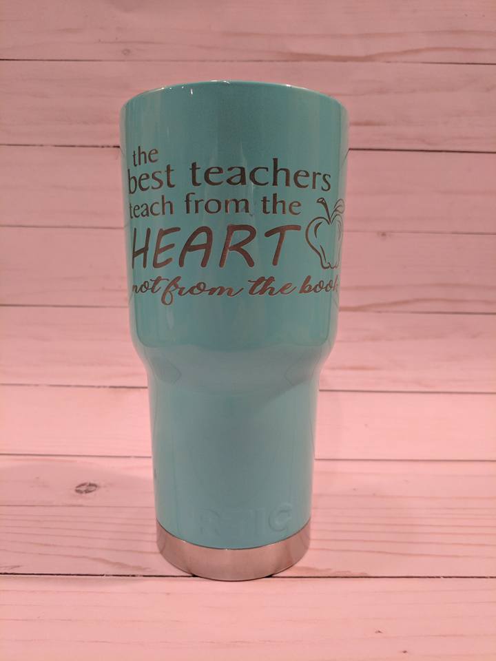 Turquoise tumbler with the text
