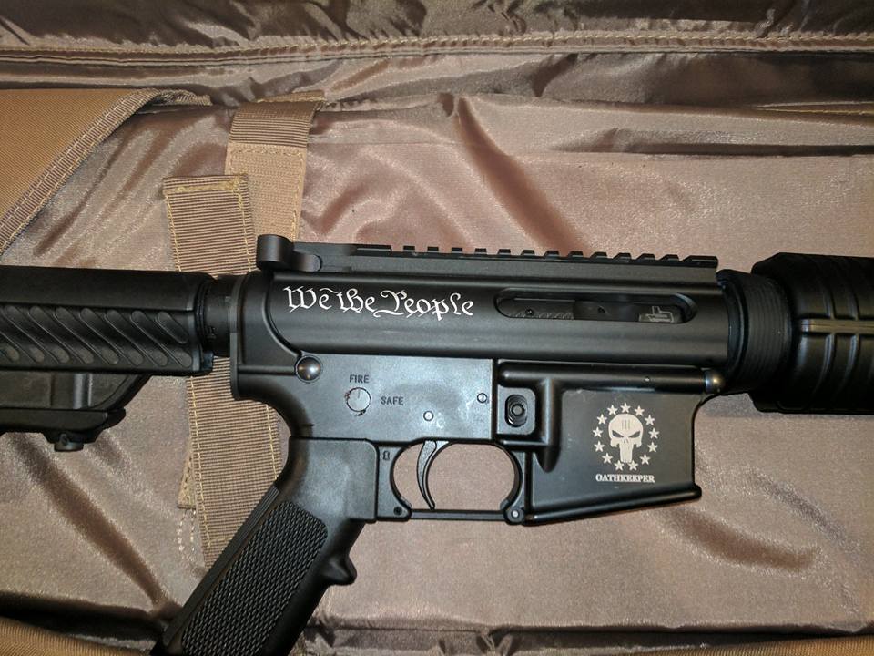 Black AR-15 rifle with