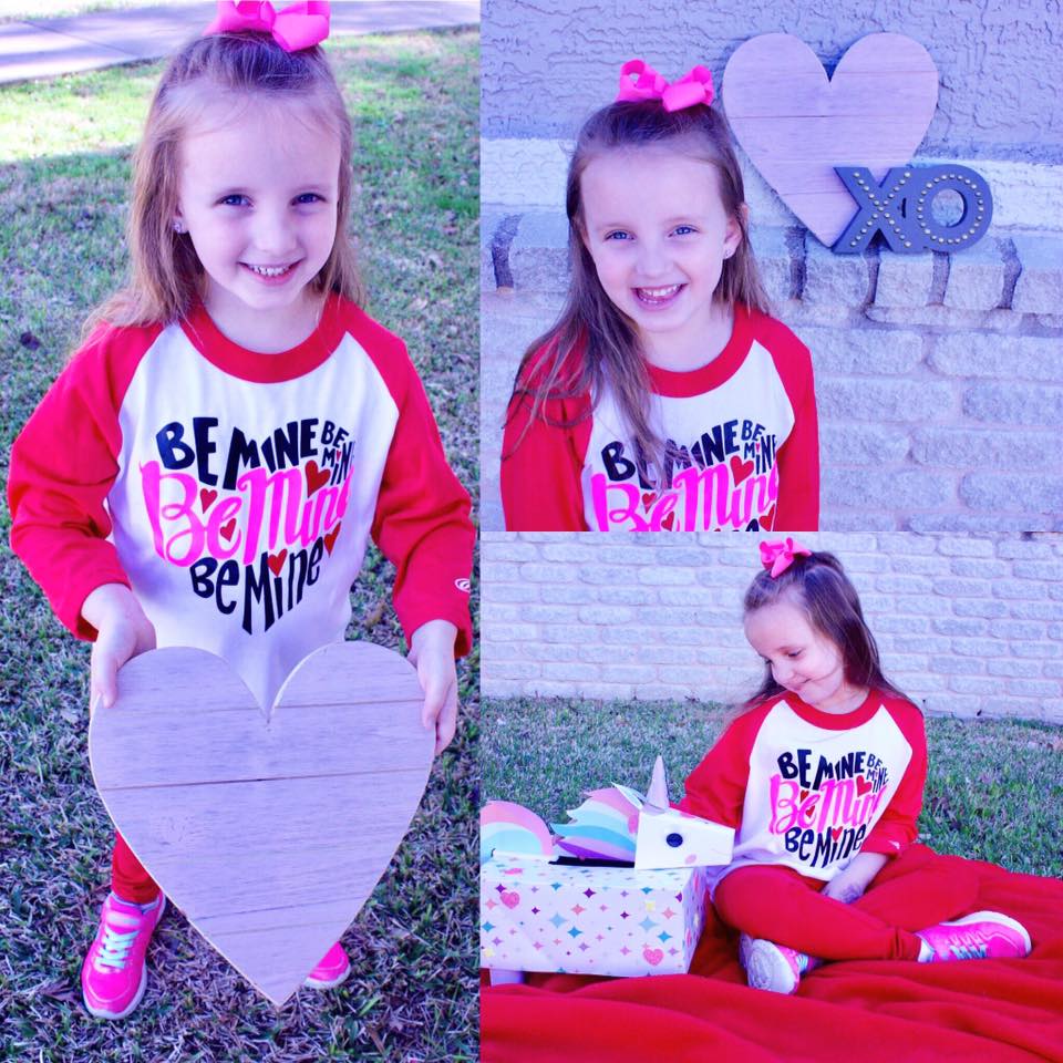 Girl in red and white shirt holding heart, wearing pink bow. Three photos: outdoor, near heart decor, with unicorn box.