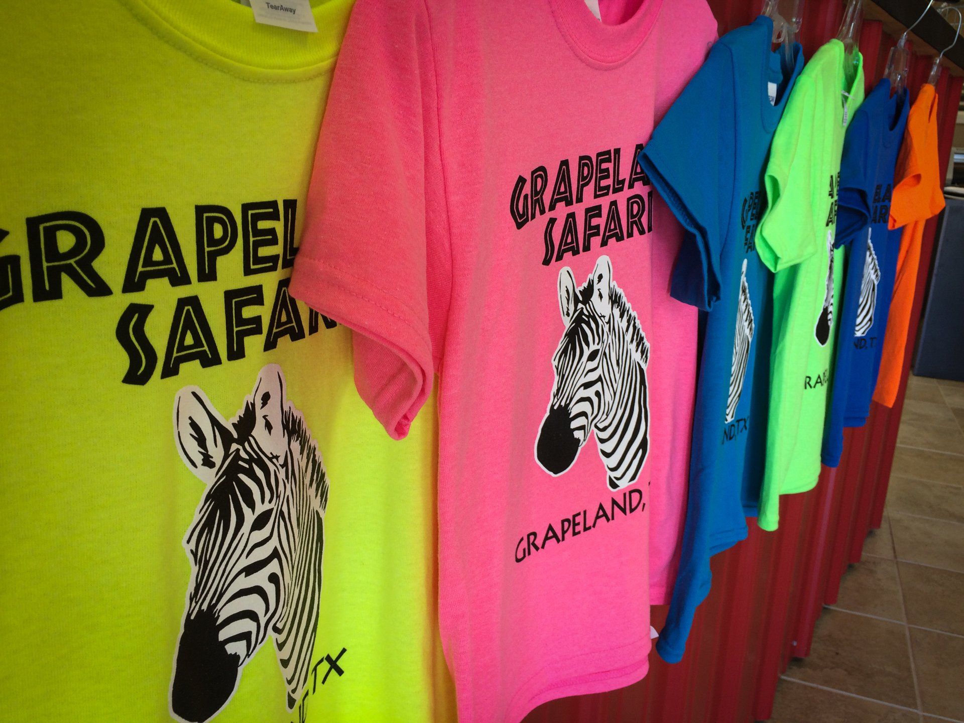 Row of colorful t-shirts for 