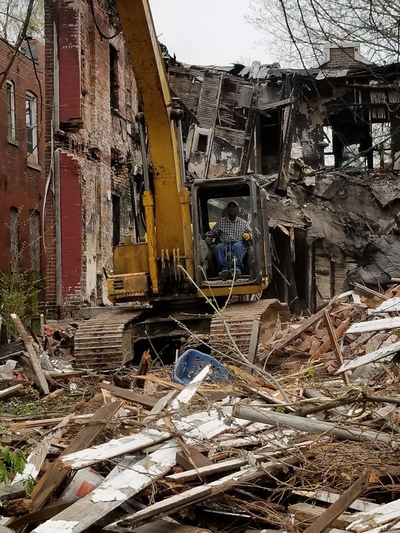Front of a house being demolished