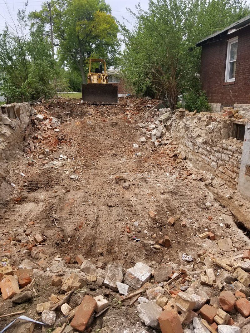 Debris being cleared after demolition