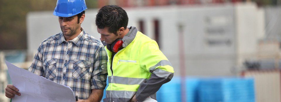 contractor looking at the plan