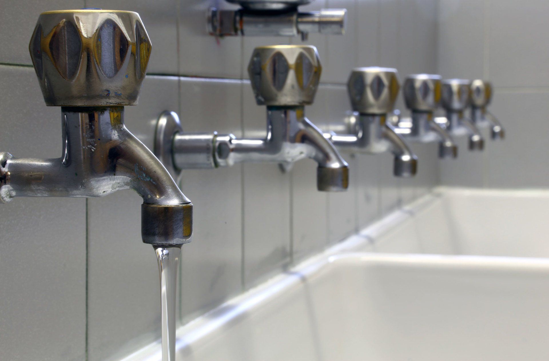 Commercial Pumps — Faucets Inside Restroom of a Commercial Building in Florence, AL Commercial Pumps — Faucets Inside Restroom of a Commercial Building in Florence, AL