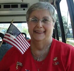 Senior Woman with American Flag — Incontinence care in Parma, OH Senior Woman with American Flag — Incontinence care in Parma, OH