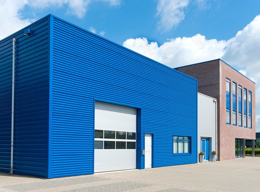 Newly Clean Industrial Building Exterior — Fort Myers, FL — AVP Contractor Inc.