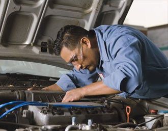 Mechanic Fixing a Car Engine Vacaville, CA Mechanic Fixing a Car Engine Vacaville, CA