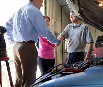 Mechanic and Customer Shaking Hands Vacaville, CA Mechanic and Customer Shaking Hands Vacaville, CA