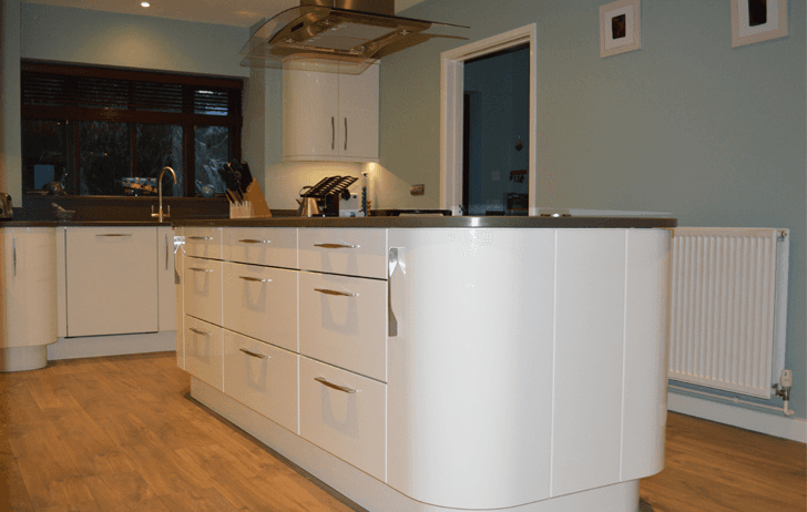 Valentino Kitchen Installation in East Harptree Cream Gloss Slab with Curves