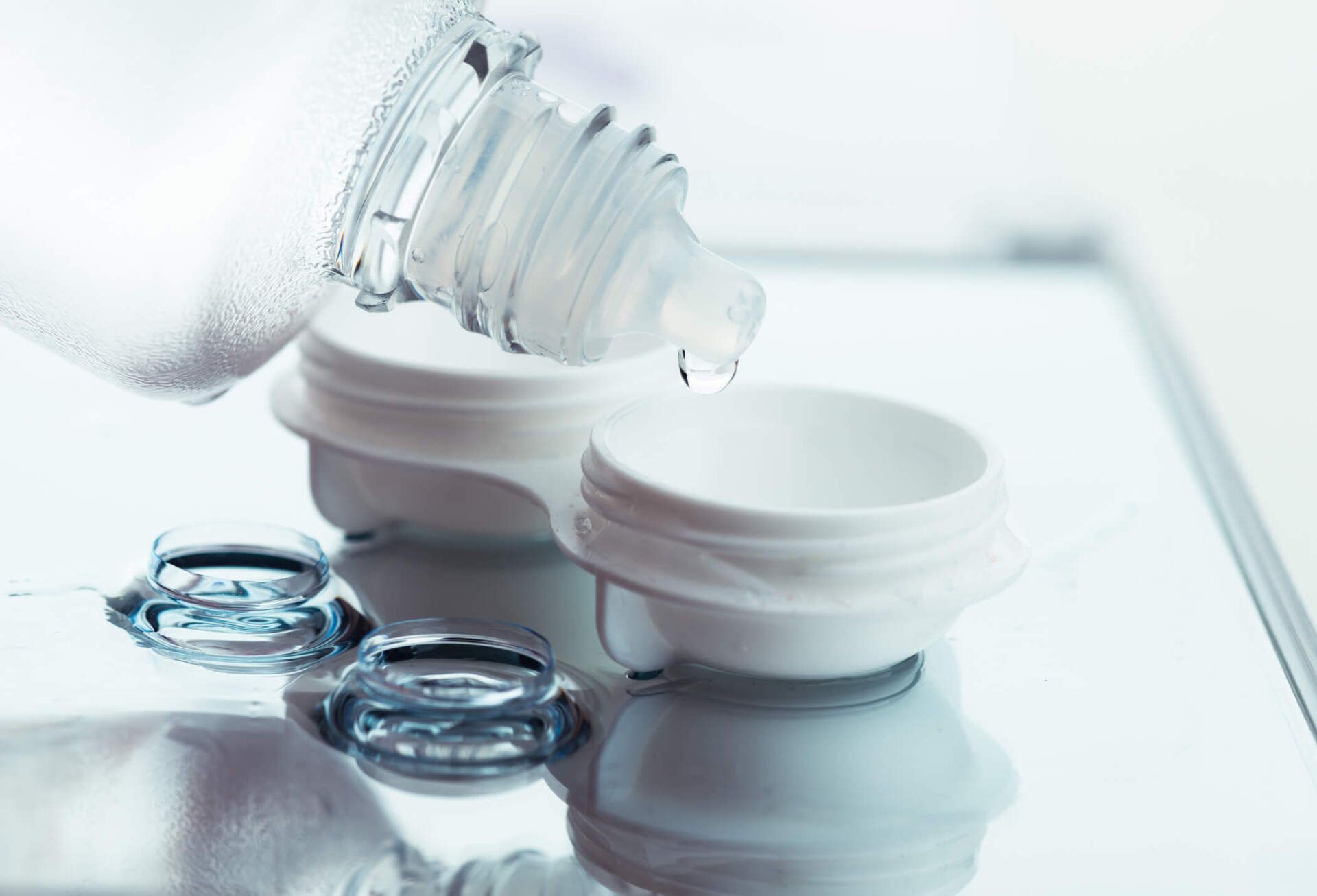 Bottle with Lens Solution and Case — Orange, MA — Leonard Optician Inc.