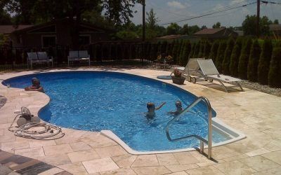 Adult and Children Enjoying Swimming at Pool — Springfield, MO — Nixa Lawn Service