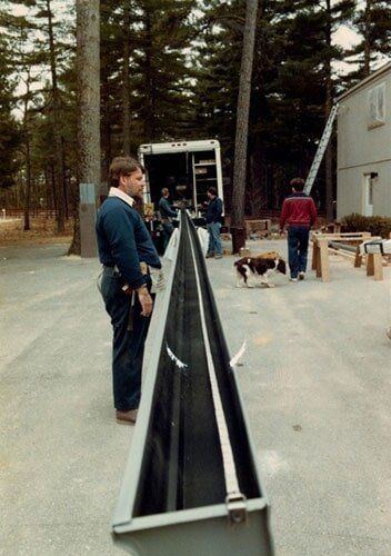 Workers Installing Gutters — Raymond, ME — The Gutter People