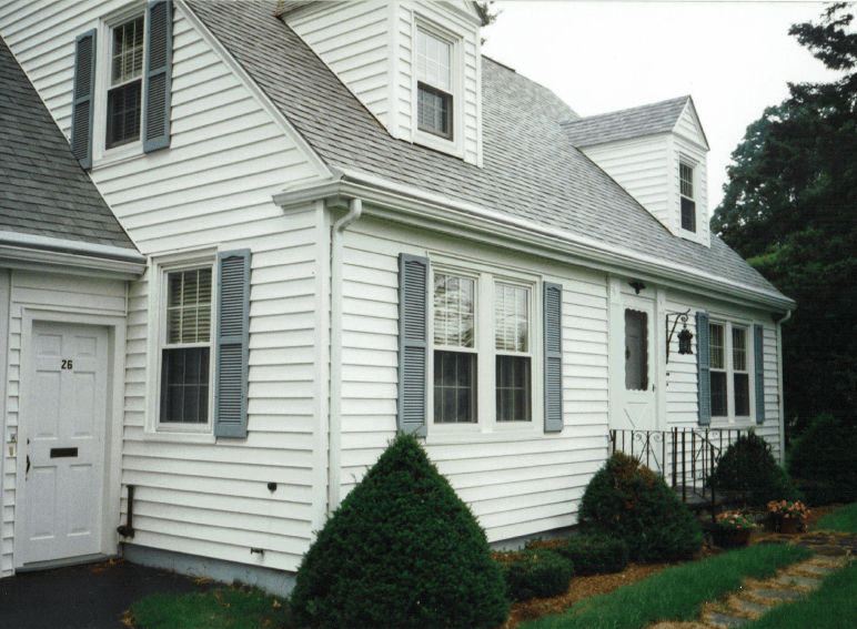 Man Removing Dirt On Gutter — Raymond, ME — The Gutter People