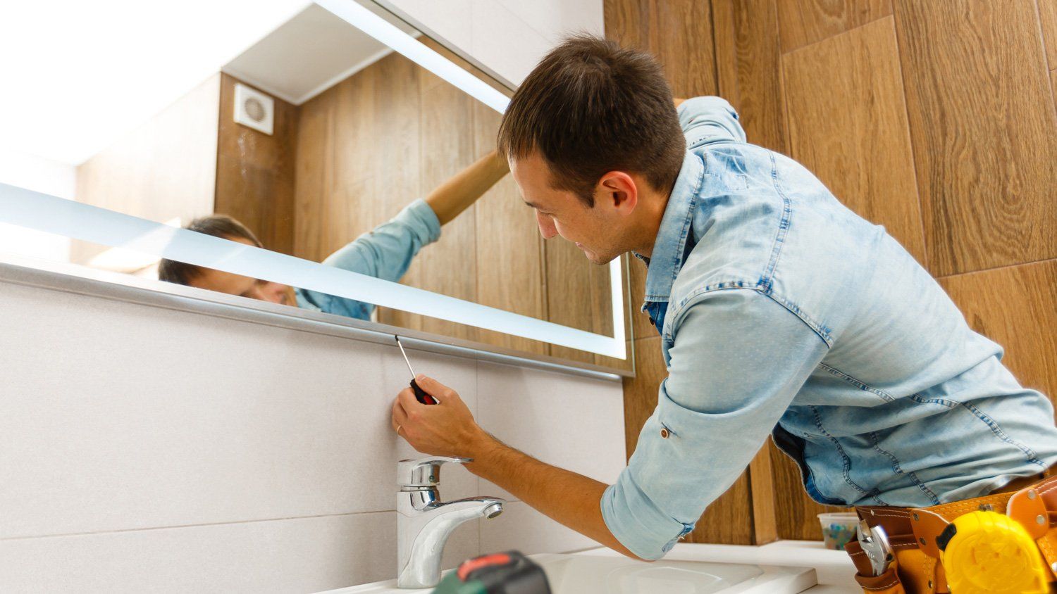 Installing Bathroom Mirror — The Colony, TX — Hurricane Glass and Showers
