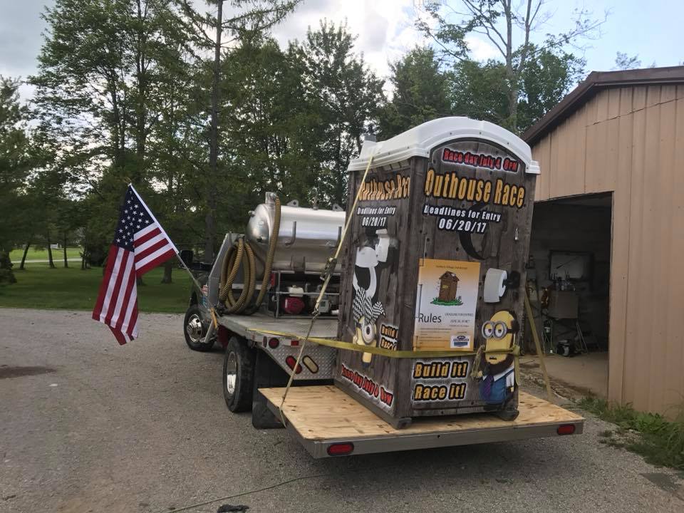 Brown Portable Toilet in Wells Septic & Drain Cleaning Truck — Delaware, OH — Wells Septic & Drain Cleaning