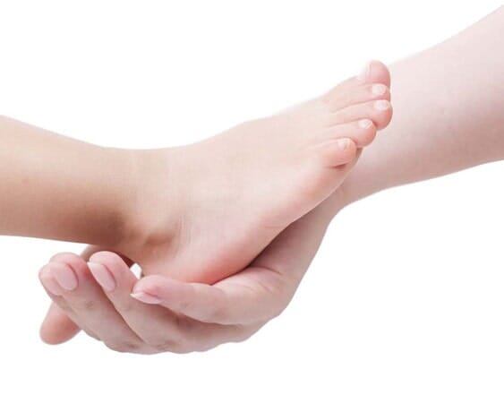 Holding a baby foot
