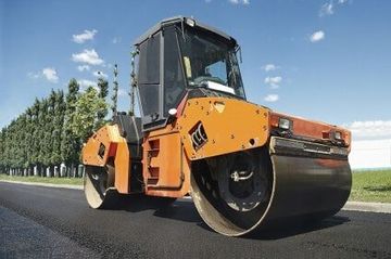 Compactor at Asphalt Paving Works - AAA Asphalt Paving Co. in Kent, WA Compactor at Asphalt Paving Works - AAA Asphalt Paving Co. in Kent, WA