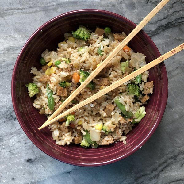 Vegan Pork Fried Rice in bowl with chopsticks