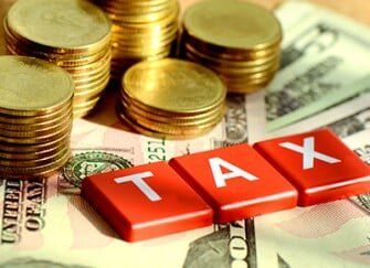 Gold coins and tax blocks. Gold coins and tax blocks.