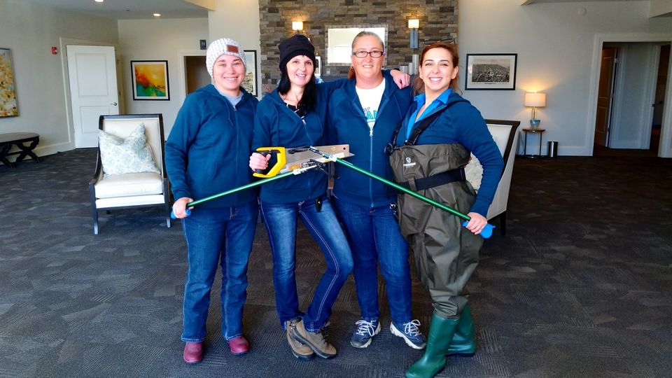 Schramka Funeral Home staff volunteer for Milwaukee river clean up