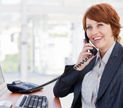 Woman Answering Telephone — Commercial in Mapleton, UT