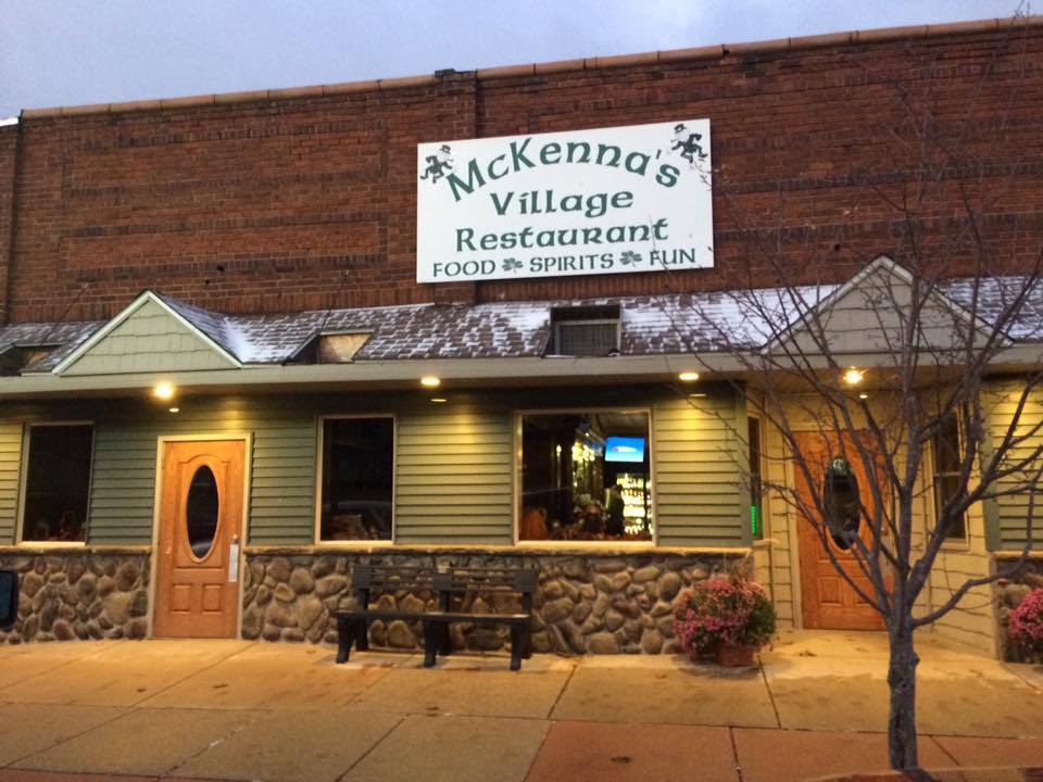 A restaurant with a sign that says mckenna 's village restaurant