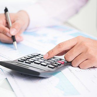 Accountant Using Calculator - Tax Preparation in Hanover, MA Accountant Using Calculator - Tax Preparation in Hanover, MA