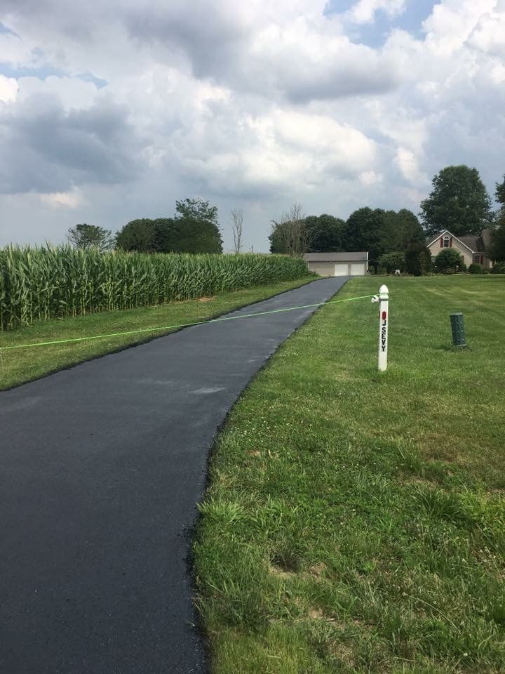 there is a fire hydrant on the side of the road .