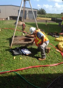 Septic hose going from Gecko Enterprise truck to residence