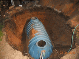 Installed septic take awaiting dirt in hole